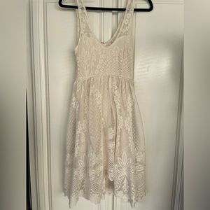 Free People, Ivory lace with a little shimmer.